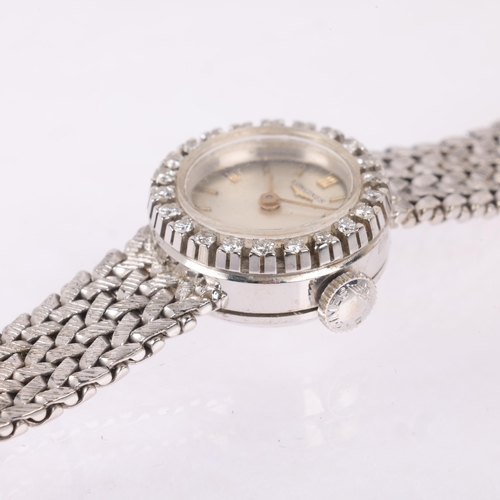 1032 - LONGINES - a lady's Vintage 18ct white gold diamond mechanical cocktail wristwatch, circa 1960s, sil... 