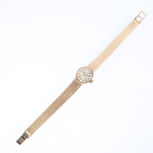 1035 - TISSOT - a lady's Vintage 9ct gold mechanical bracelet watch, circa 1970s, silvered dial with applie... 