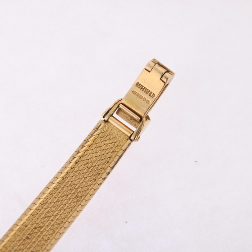 1035 - TISSOT - a lady's Vintage 9ct gold mechanical bracelet watch, circa 1970s, silvered dial with applie... 