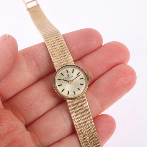 1035 - TISSOT - a lady's Vintage 9ct gold mechanical bracelet watch, circa 1970s, silvered dial with applie... 