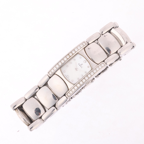 1036 - EBEL - a lady's stainless steel and diamond Beluga Manchette quartz bracelet watch, ref. E9057A28-10... 