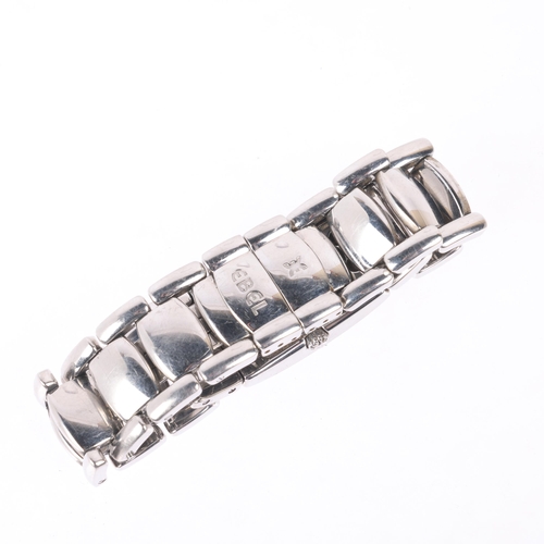 1036 - EBEL - a lady's stainless steel and diamond Beluga Manchette quartz bracelet watch, ref. E9057A28-10... 