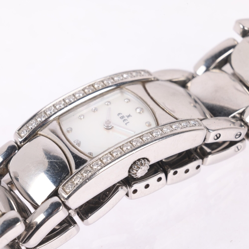 1036 - EBEL - a lady's stainless steel and diamond Beluga Manchette quartz bracelet watch, ref. E9057A28-10... 