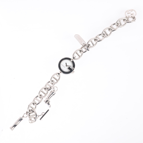 1038 - GUCCI - a lady's stainless steel 107 Series quartz bracelet watch, lotus white mother-of-pearl dial,... 