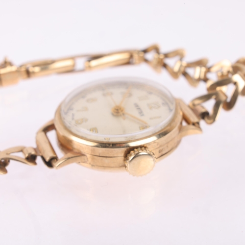 1039 - VERTEX - a lady's 9ct mechanical bracelet watch, silvered dial with gilt Arabic numerals, pencil han... 