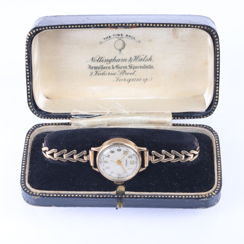 1039 - VERTEX - a lady's 9ct mechanical bracelet watch, silvered dial with gilt Arabic numerals, pencil han... 