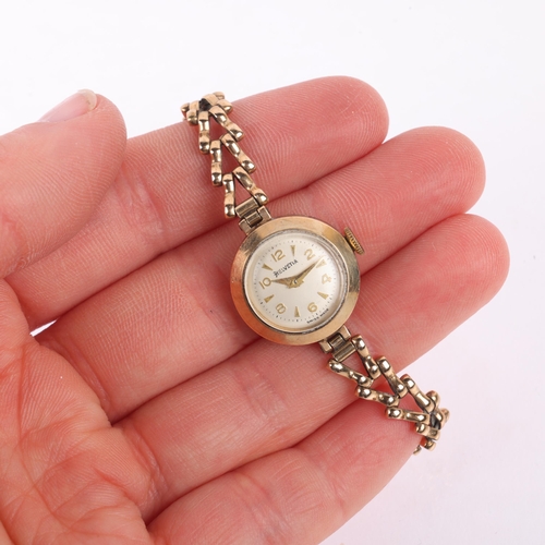 1040 - HELVETIA - a lady's 9ct gold mechanical bracelet watch, silvered dial with applied gilt eighthly Ara... 