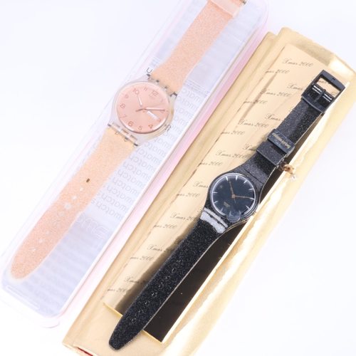 1056 - 2 Swatch watches, comprising Xmas 2000, and Pink Glistar, both not currently working, both boxed (2)