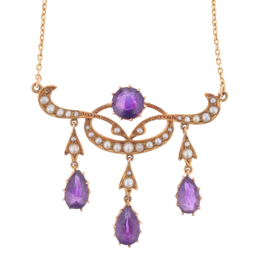 1100 - An Art Nouveau Edwardian 15ct gold amethyst and split pearl openwork pendant necklace, circa 1905, t... 