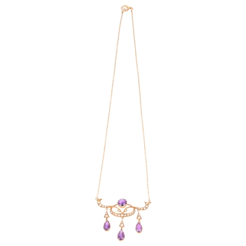 1100 - An Art Nouveau Edwardian 15ct gold amethyst and split pearl openwork pendant necklace, circa 1905, t... 