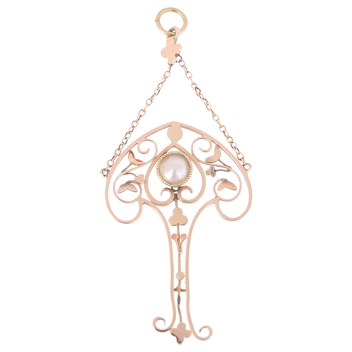 1110 - An Edwardian Art Nouveau 9ct rose gold blister pearl openwork lavaliere pendant, circa 1905, the clu... 