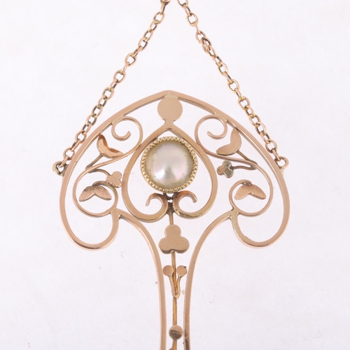 1110 - An Edwardian Art Nouveau 9ct rose gold blister pearl openwork lavaliere pendant, circa 1905, the clu... 