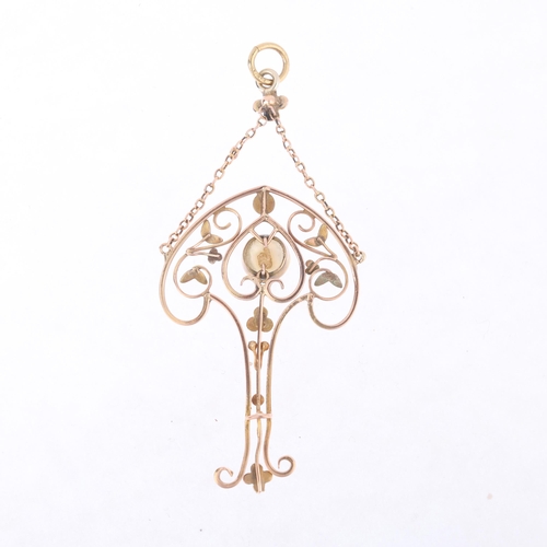 1110 - An Edwardian Art Nouveau 9ct rose gold blister pearl openwork lavaliere pendant, circa 1905, the clu... 