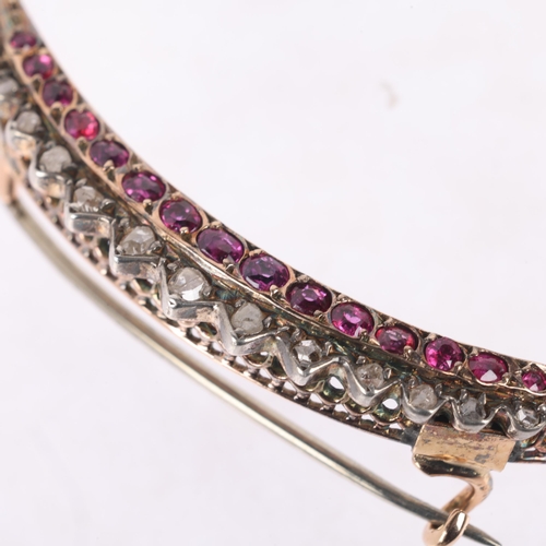 1112 - A Victorian ruby and diamond crescent brooch, circa 1890, set with oval mixed-cut rubies and rose-cu... 