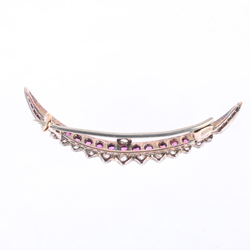 1112 - A Victorian ruby and diamond crescent brooch, circa 1890, set with oval mixed-cut rubies and rose-cu... 