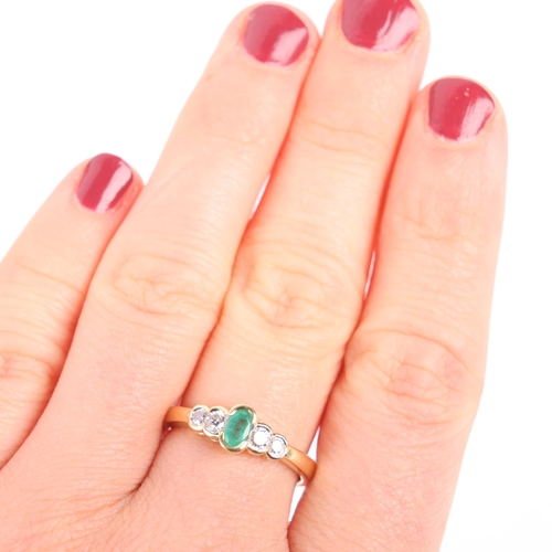 1120 - An 18ct gold five stone emerald and diamond ring, set with oval mixed-cut emerald and modern round b... 