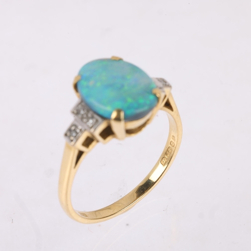 1128 - An 18ct gold black opal doublet and diamond dress ring, maker S&R, London 1975, claw set with oval c... 