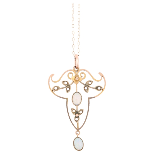 1129 - An Edwardian Art Nouveau 9ct rose gold opal and split pearl openwork pendant necklace, on 9ct fine c... 