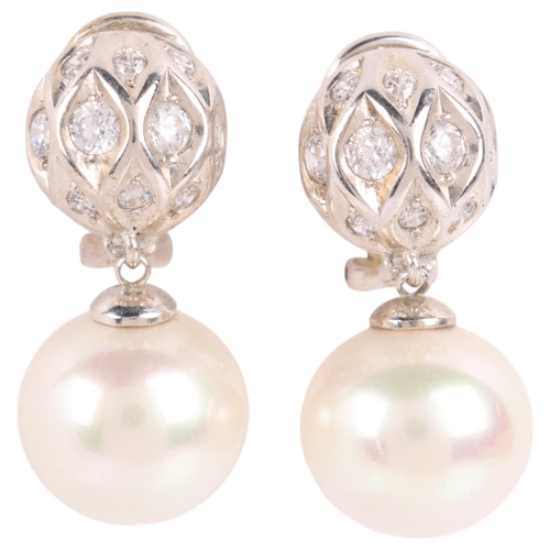 1139 - A pair of sterling silver whole cultured pearl and cubic zirconia drop earrings, with clip and post ... 