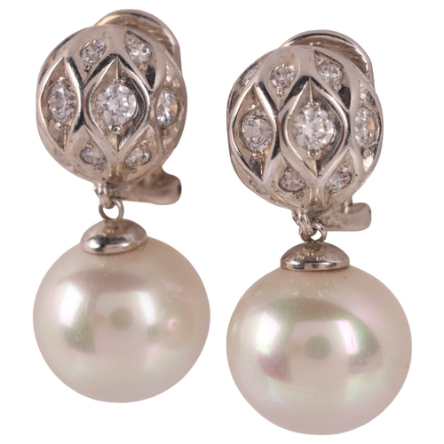 1139 - A pair of sterling silver whole cultured pearl and cubic zirconia drop earrings, with clip and post ... 