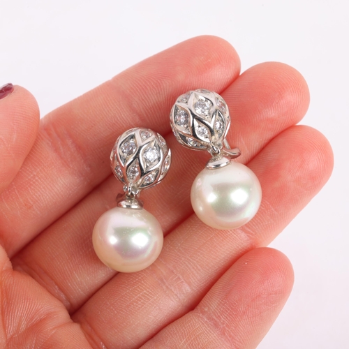 1139 - A pair of sterling silver whole cultured pearl and cubic zirconia drop earrings, with clip and post ... 