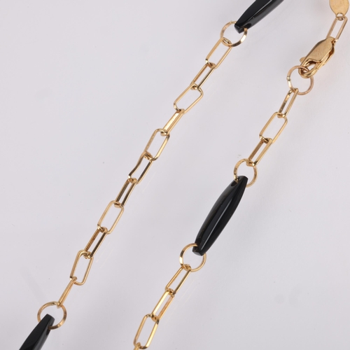 1140 - A 9ct gold onyx spacer link chain necklace, 50cm, 8.2g