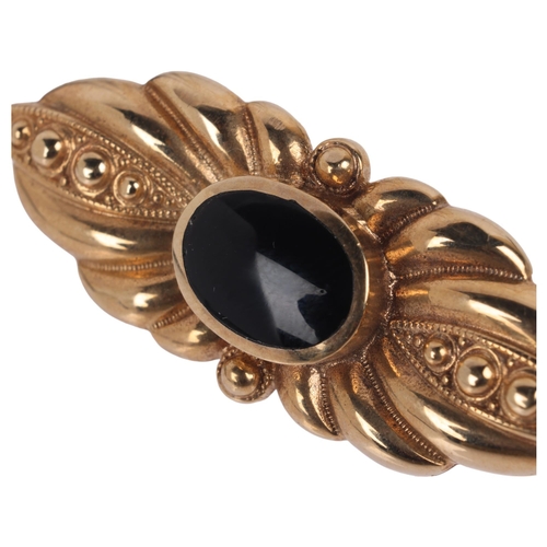 1141 - A 9ct gold black onyx brooch, maker CWS, Sheffield 1997, 39.4mm, 7.1g