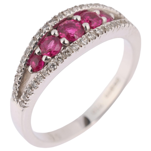 1149 - An 18ct white gold ruby and diamond ring, centrally claw set with 5 graduated round-cut rubies, flan... 