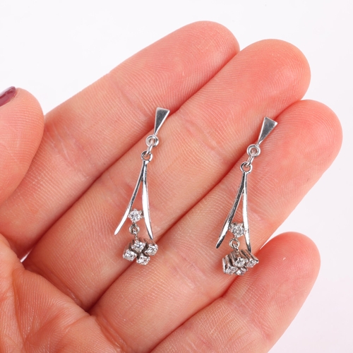 1153 - A pair of 18ct white gold diamond drop earrings, set with modern round brilliant-cut diamonds, with ... 