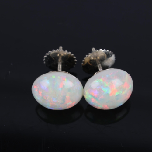 1158 - A pair of Edwardian 9ct white gold opal earrings, each set with round cabochon white opal, with scre... 