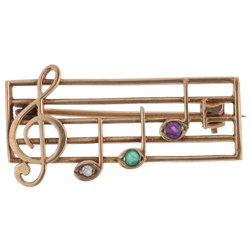 1166 - A Vintage 9ct gold gem set musical bar 'DEAR' brooch, maker RT, London 1991, set with diamond emeral... 