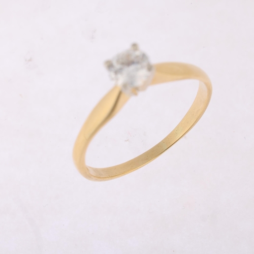 1169 - An 18ct gold 0.5ct single stone diamond ring, claw set with round transitional-cut diamond, colour a... 