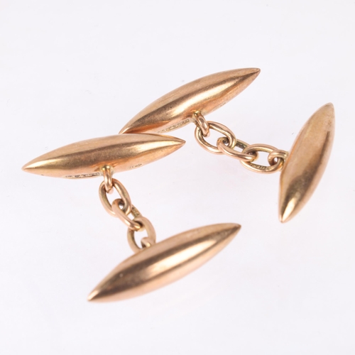 1194 - A pair of 9ct rose gold torpedo cufflinks, by Saunders & Shepherd, London 1919, 24mm, 6g