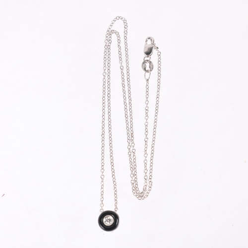 1200 - An 18ct white gold onyx and diamond target pendant necklace, set with 0.05ct modern round brilliant-... 