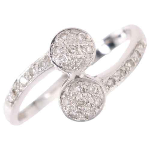 1201 - An 18ct white gold diamond cluster crossover ring, pave set with modern round brilliant-cut diamonds... 