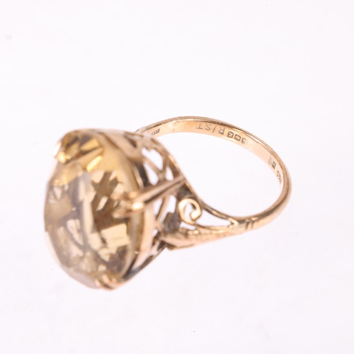 A 9ct gold single stone citrine dress ring, maker W&G, Birmingham 1960,  claw set with oval mixed-cut