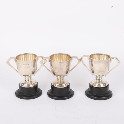 1686 - 3 Art Deco silver 2-handled golfing trophies, 7.5cm, 7.7oz weighable