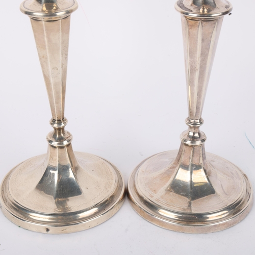 1695 - A pair of Edwardian silver table candlesticks, Fordham & Faulkner, Sheffield 1905, 21cm, loaded base... 