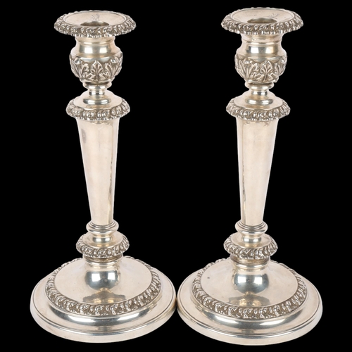 1696 - A pair of George silver table candlesticks, George & Thomas Settle, Sheffield 1825, relief embossed ... 