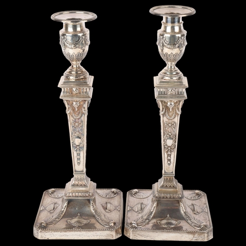 1697 - A pair of Victorian silver Neo-Classical Revival table candlesticks, Hawksworth, Eyre & Co Ltd, Shef... 