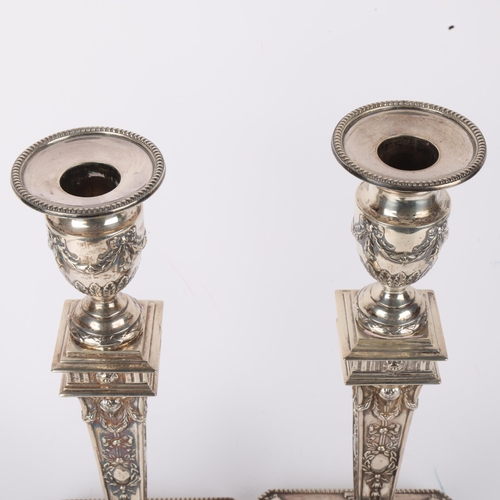 1697 - A pair of Victorian silver Neo-Classical Revival table candlesticks, Hawksworth, Eyre & Co Ltd, Shef... 