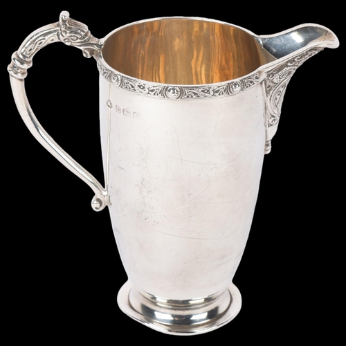 1698 - A George VI silver Celtic Revival cream jug, Adie Brothers Ltd, Birmingham 1937, 10cm, 3.2oz