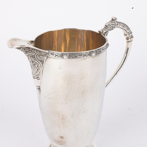 1698 - A George VI silver Celtic Revival cream jug, Adie Brothers Ltd, Birmingham 1937, 10cm, 3.2oz