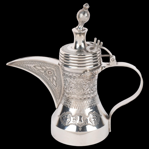 1701 - A heavy gauge Omani sterling silver Dallah coffee pot, Ayj Silver, relief embossed decoration, 26cm,... 