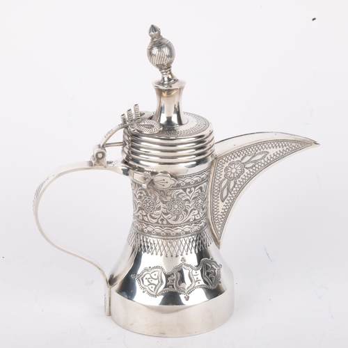 1701 - A heavy gauge Omani sterling silver Dallah coffee pot, Ayj Silver, relief embossed decoration, 26cm,... 