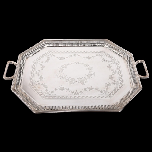 1706 - A late Victorian octagonal silver 2-handled tea tray, Henry Stratford Ltd, London 1898, bright-cut f... 