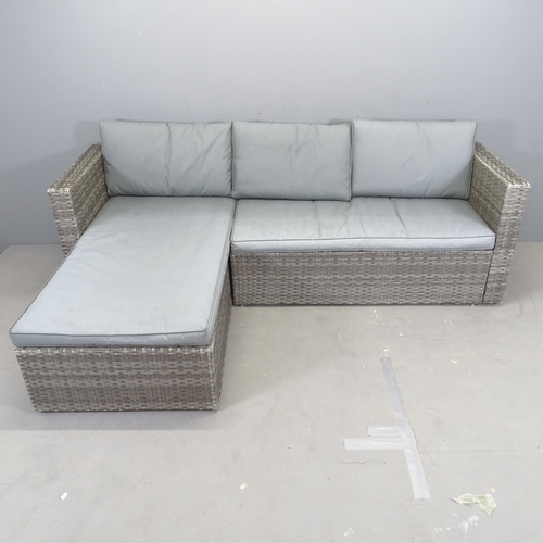 3010 - A modern two-section rattan corner garden sofa. Overall (excluding cushions) 211x63x140cm.