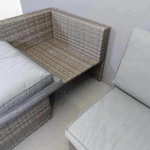 3010 - A modern two-section rattan corner garden sofa. Overall (excluding cushions) 211x63x140cm.