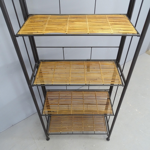 3011 - A mid-century style bamboo folding shelving unit  with black tubular steel frame. 69x183x32cm.