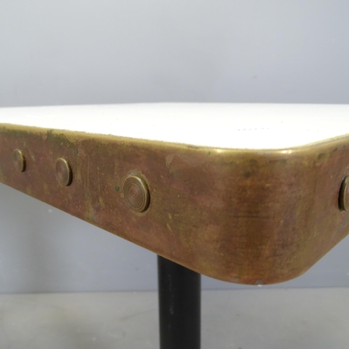 3015 - A pair of modern cafe tables, with laminated top surrounded by copper band and mounted on cast iron ... 